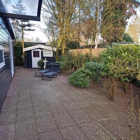 Апартаменты Modern Chalet Met Tuin Nabij Het Bos In Пюттен